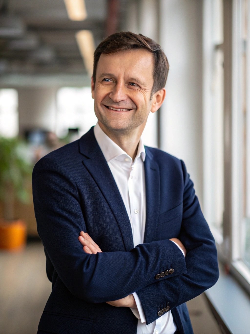 Professional portrait of senior chartered surveyor specializing in homebuyer reports